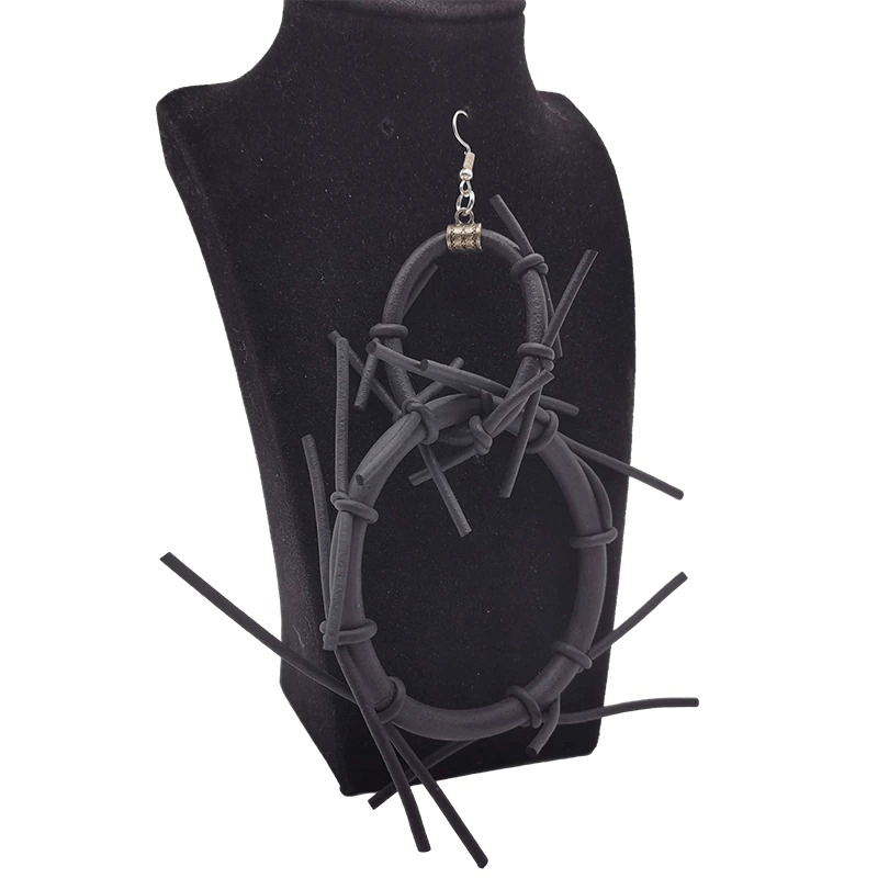 Handmade black rubber punk earrings showcasing a unique design, perfect for adding a gothic touch to women's outfits.