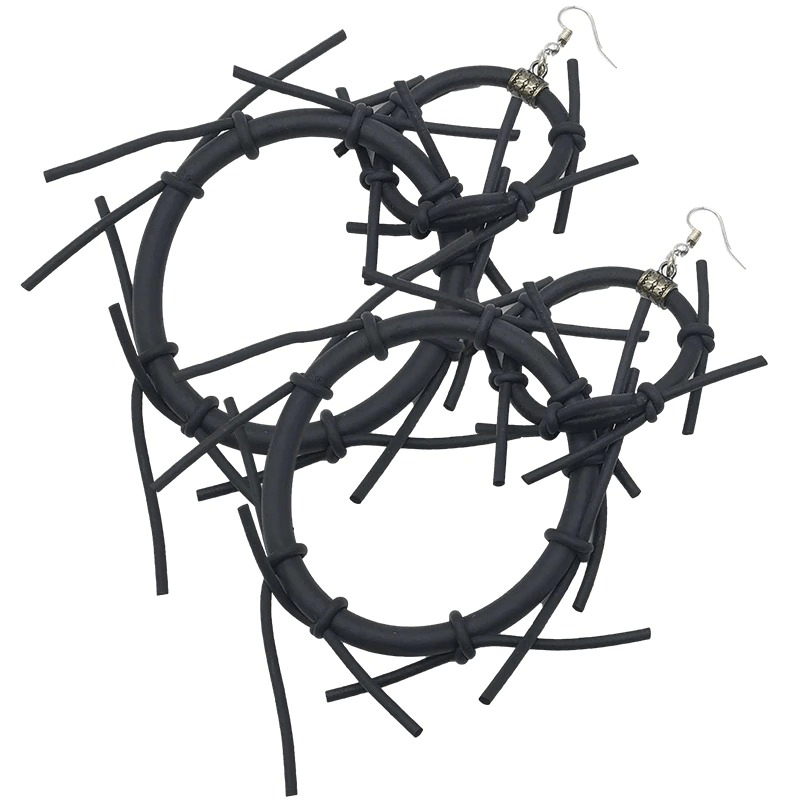 Handmade punk style big black rubber earrings with unique design and stylish details, perfect for bold women's accessories.