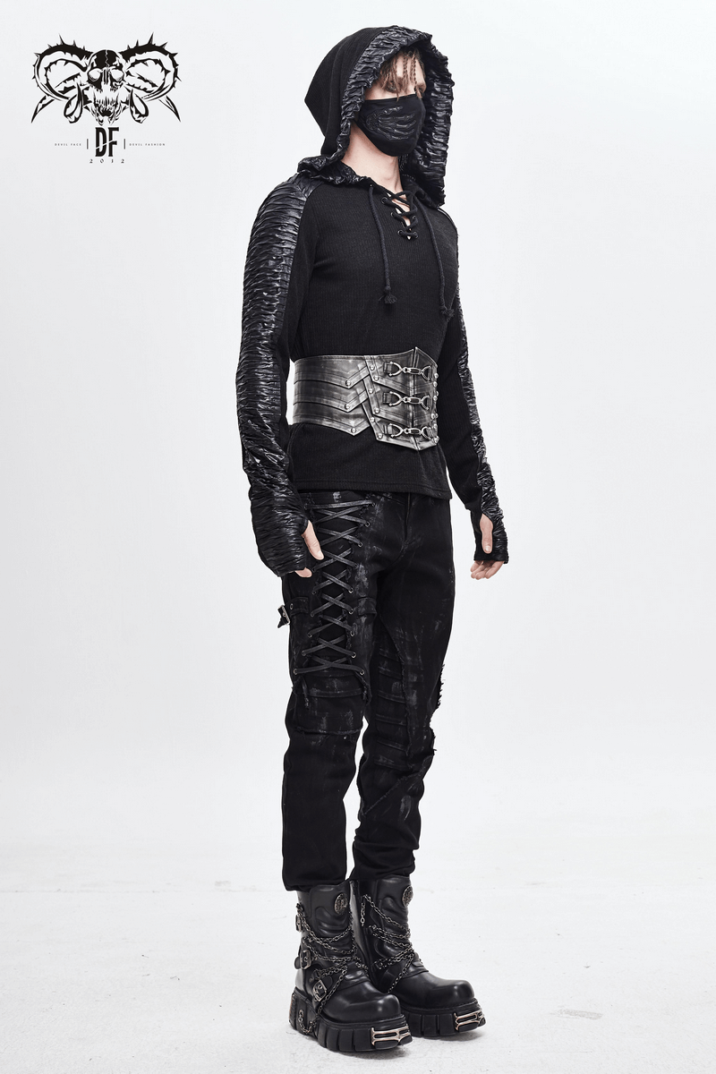 Punk style man in black hoodie and corset belt, showcasing a modern retro fashion vibe with gothic elements.