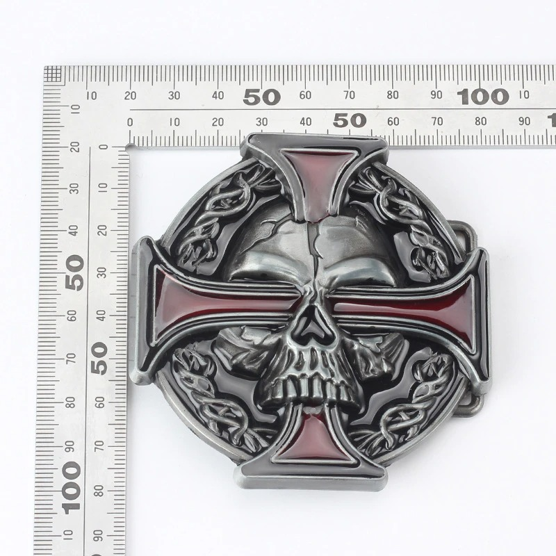 Punk style unisex metal buckle featuring a skull and cross design with red accents and intricate detailing.