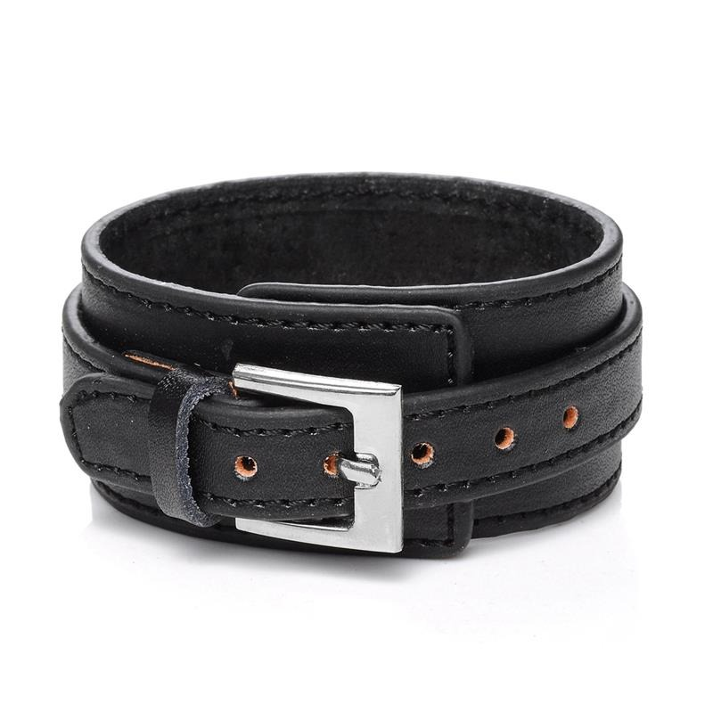 Punk style black genuine leather wristband with adjustable silver buckle for casual and rock outfits.