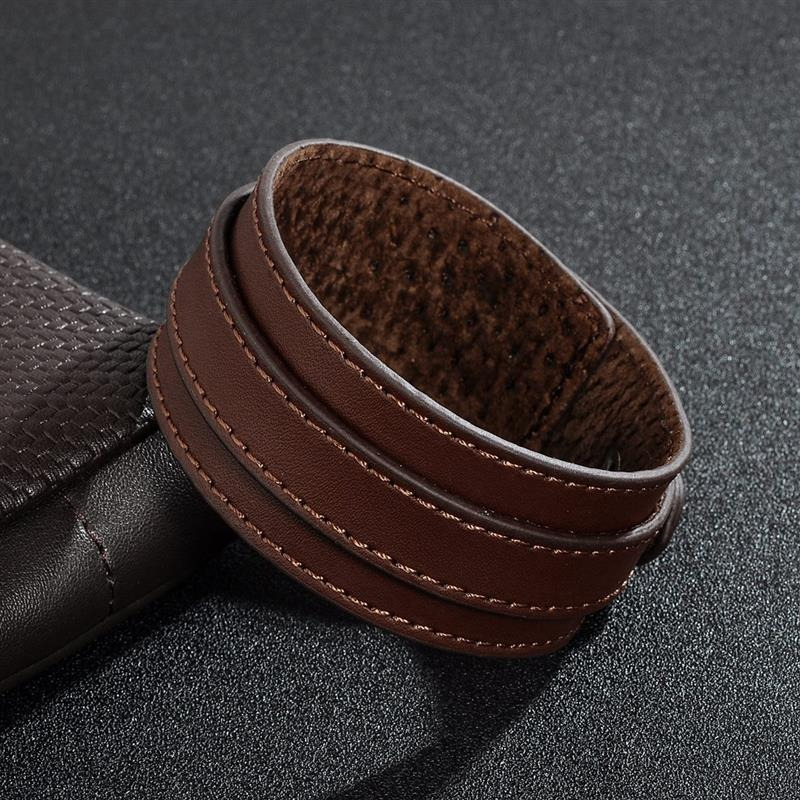 Brown genuine leather punk style wristband cuff bracelet on a dark background, perfect for rock or casual outfits.