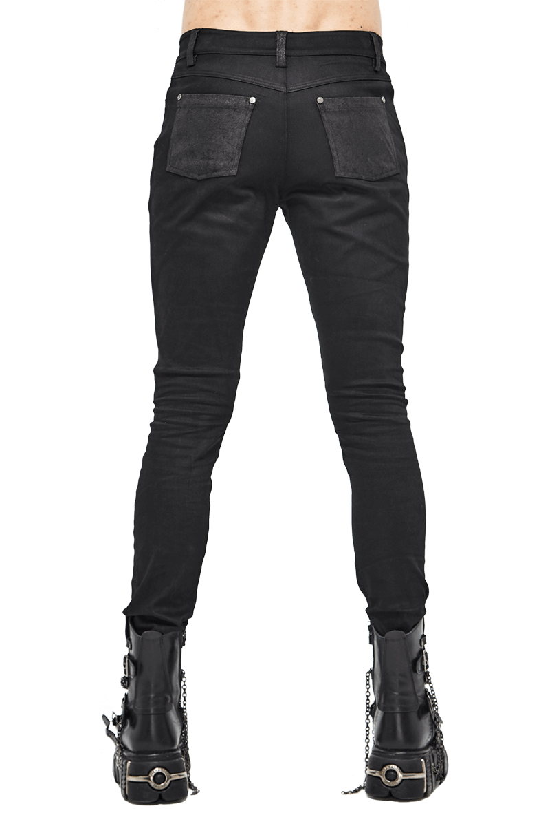 Back view of men's punk style black jeans with faux leather trim, paired with black lace-up boots.