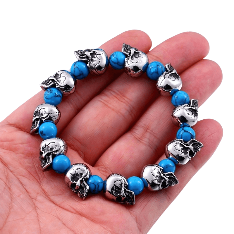 Unisex punk-style elastic wristband with blue beads and silver skull head beads, perfect trendy accessory.
