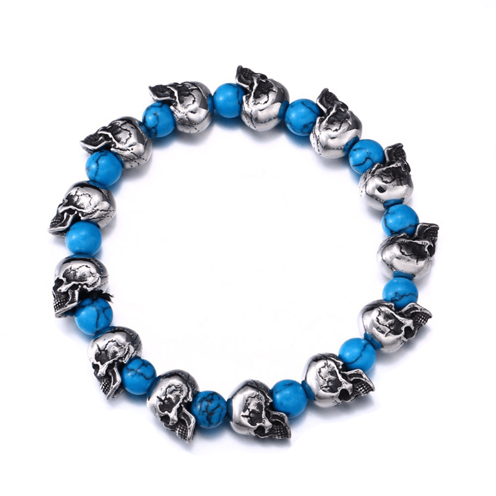 Punk style elastic wristband featuring skull head beads and blue stones, perfect unisex jewelry accessory for edgy fashion.