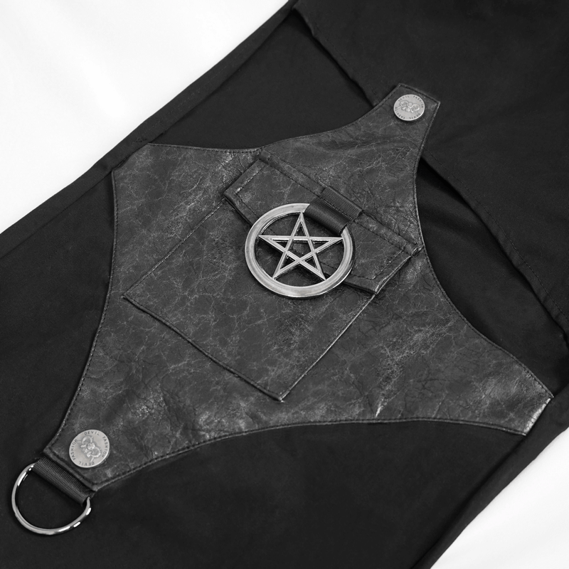 Close-up of black cargo pants featuring a unique asymmetrical pocket and silver pentagram detail in a punk style.