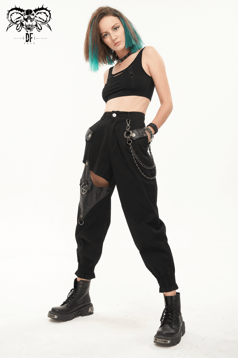 Model showcasing black asymmetrical cargo pants with detachable chain, perfect for trendy punk outfits.
