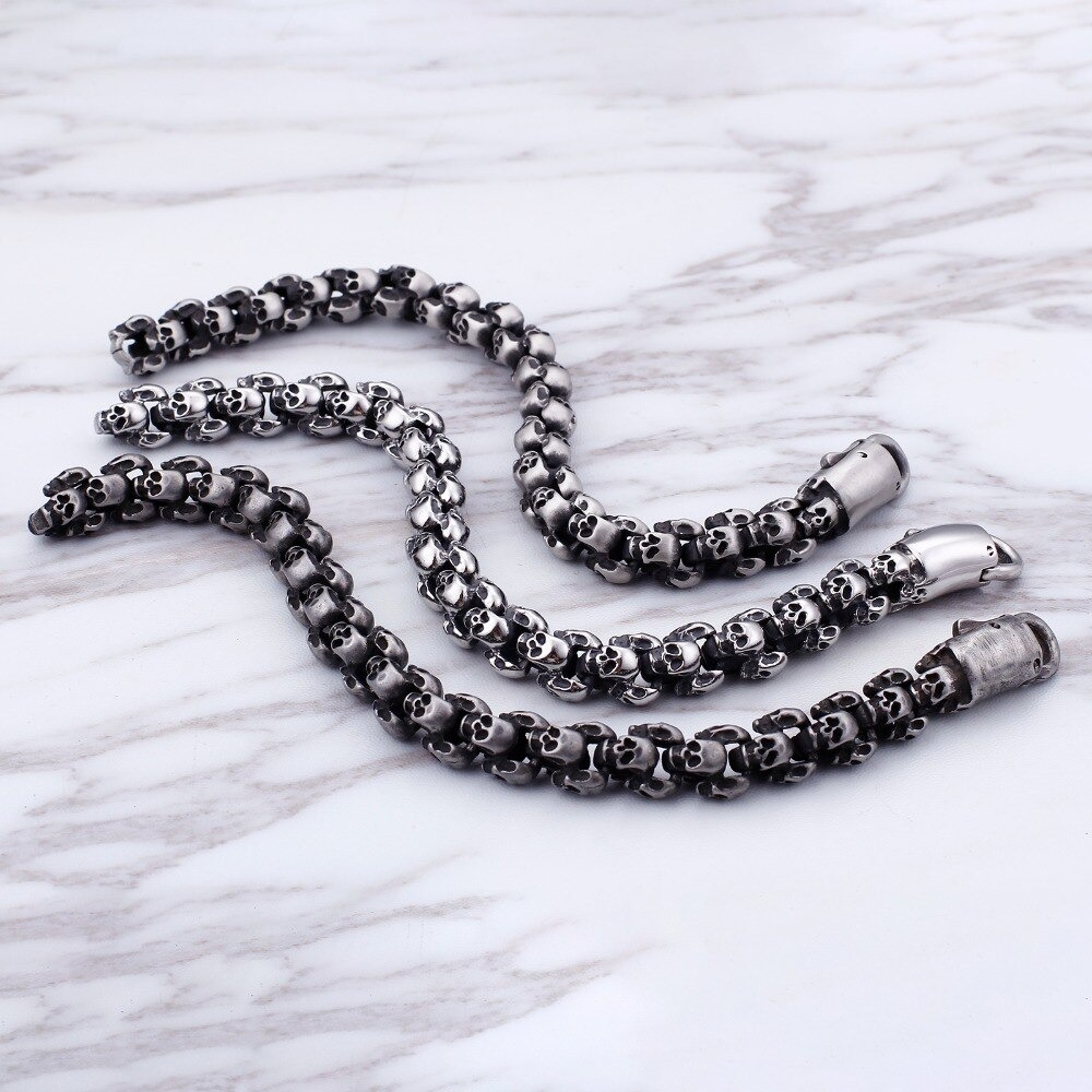 Punk style stainless steel skull bracelets in various designs, perfect for men's edgy fashion.