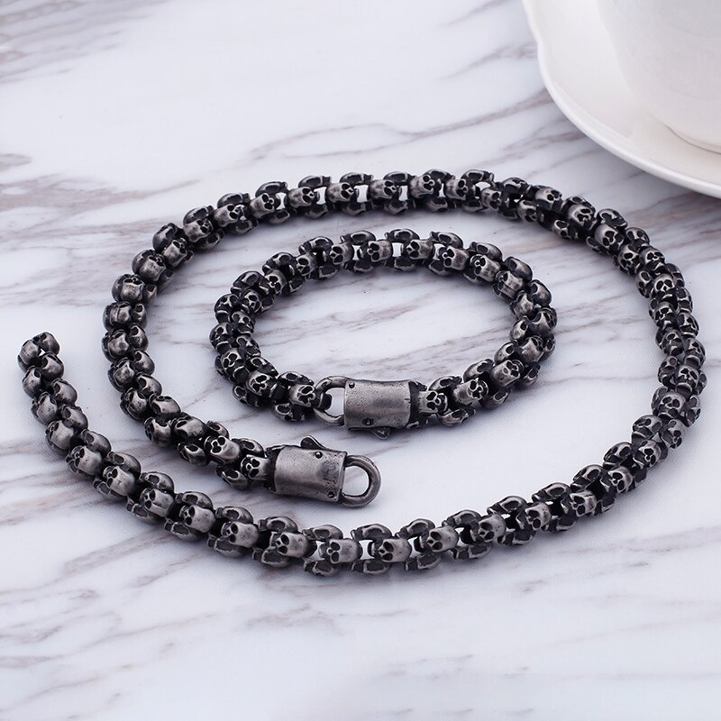 Punk style stainless steel skull bracelet for men, featuring unique skull designs, perfect for edgy outfits.