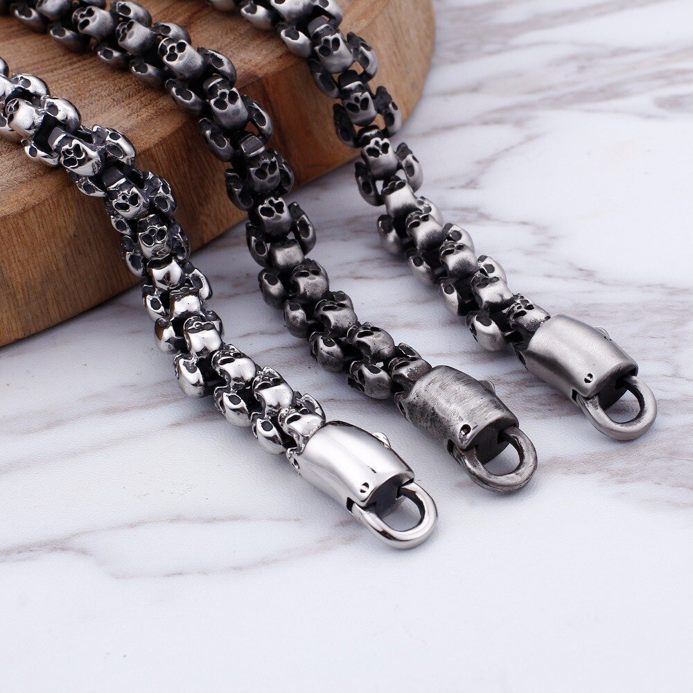 Stainless steel punk style skull bracelet featuring unique skull designs, perfect for men's edgy fashion.