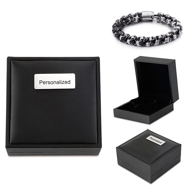Men's punk style skull bracelet in personalized black gift box, showcasing cool stainless steel design.