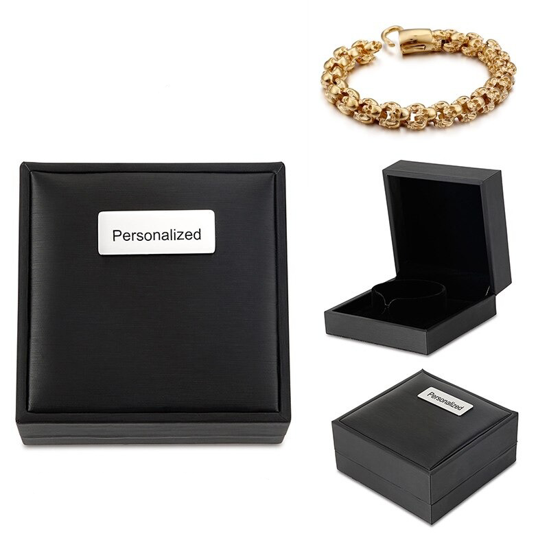 Personalized black jewelry box with a golden chain bracelet, perfect for gifts or special occasions.