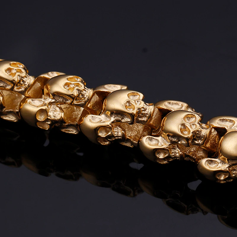Gold punk style skull bracelet showcasing intricate skull design, perfect for men's stainless steel jewelry.