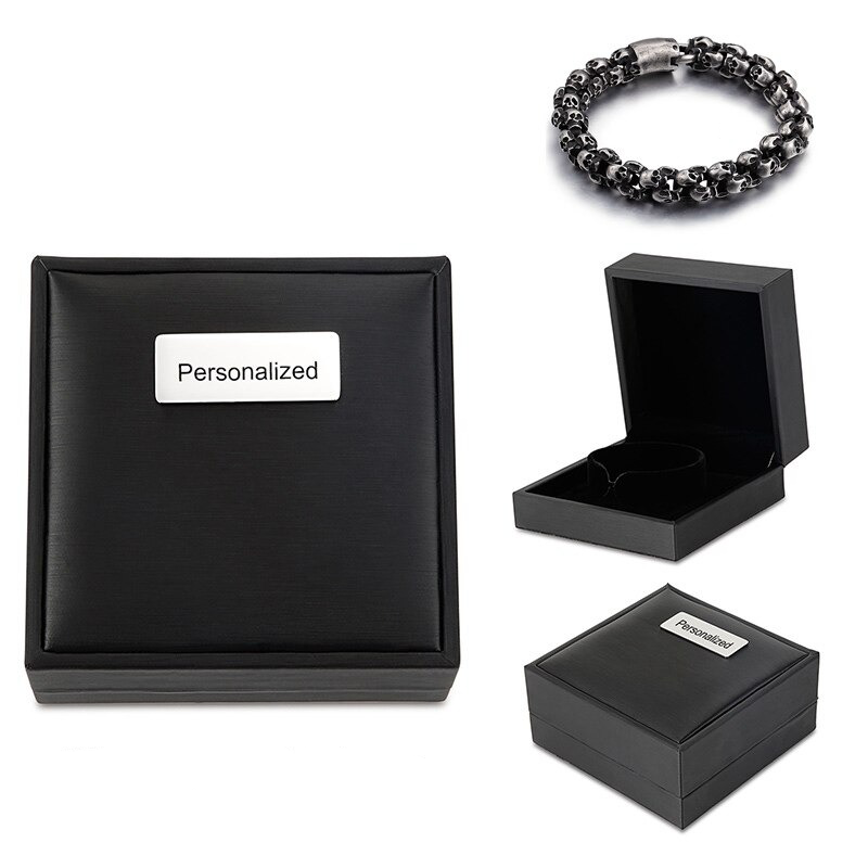 Stylish men's punk skull bracelet displayed in a personalized black box for a unique gift.