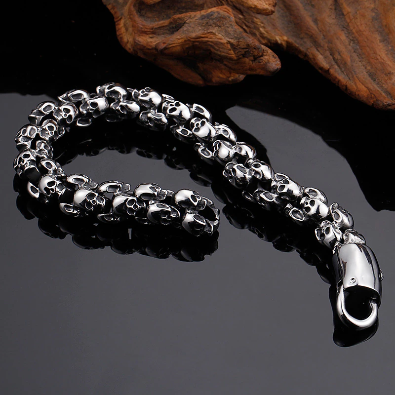 Punk style stainless steel skull bracelet for men, featuring a unique skull design perfect for edgy outfits.