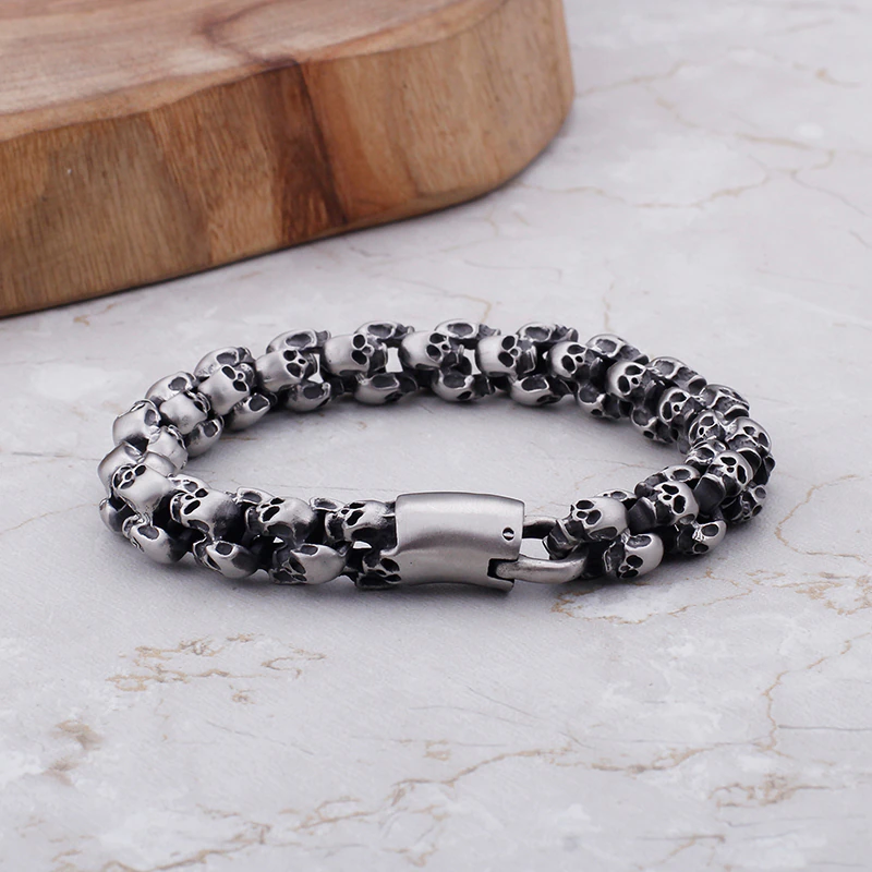 Punk style stainless steel skull bracelet for men, perfect for enhancing your edgy outfit with a bold accessory.