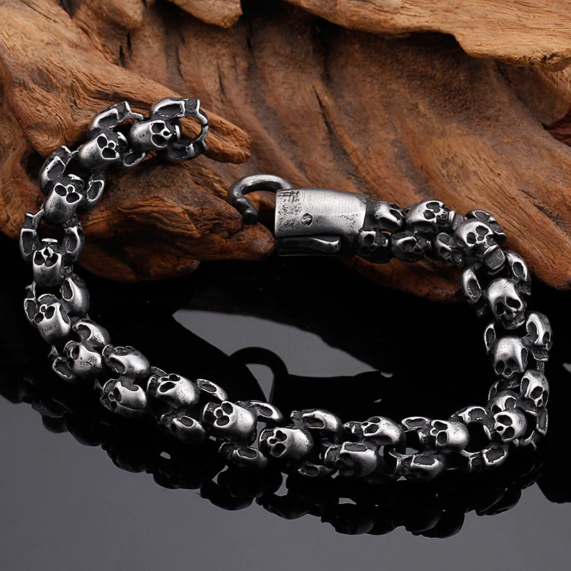 Punk style stainless steel skull bracelet for men, featuring creative skull designs, perfect for enhancing punk outfits.