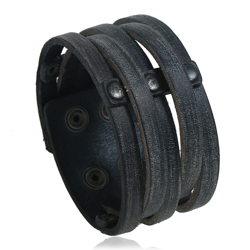 Wide punk leather bracelet with rivets, unisex fashion accessory for men and women.