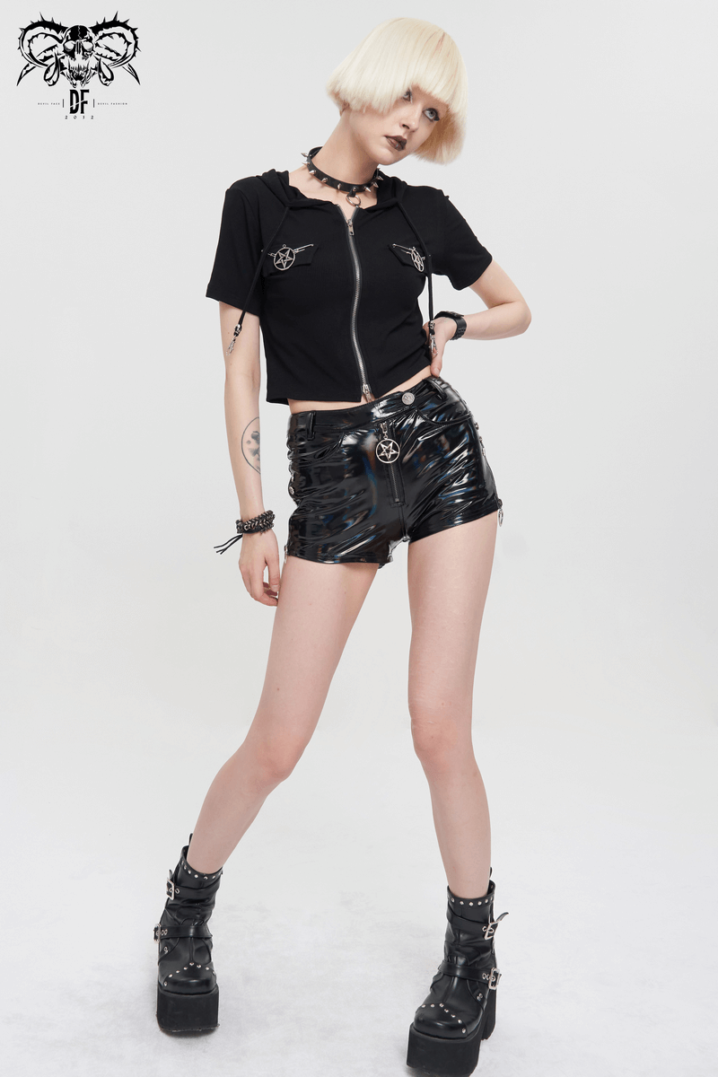 Model wearing punk black faux leather shorts with pentagram, styled with a black crop top and edgy accessories.