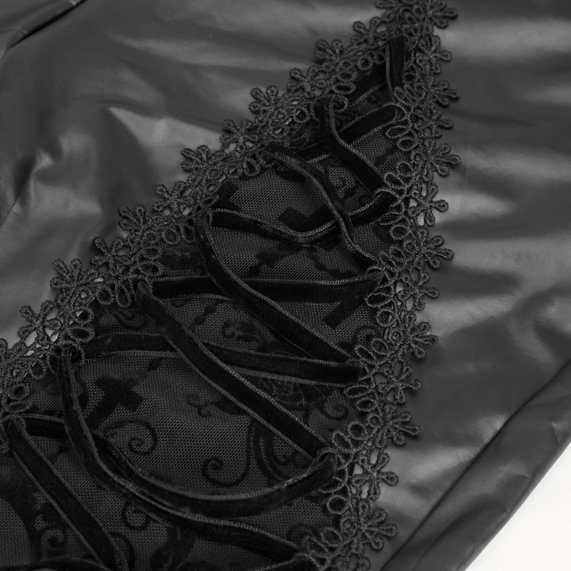 Close-up of black leggings featuring lace-up detail and semi-transparent lace overlay, perfect for punk gothic style.