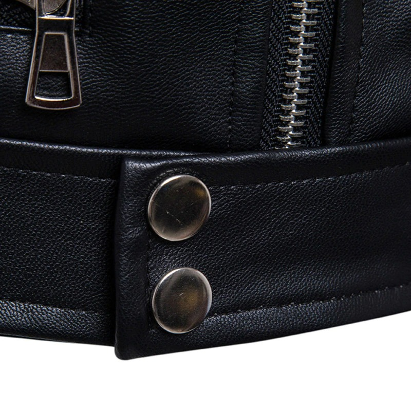 Close-up of black PU leather men's jacket showcasing zipper and snap buttons, highlighting punk rocker style.