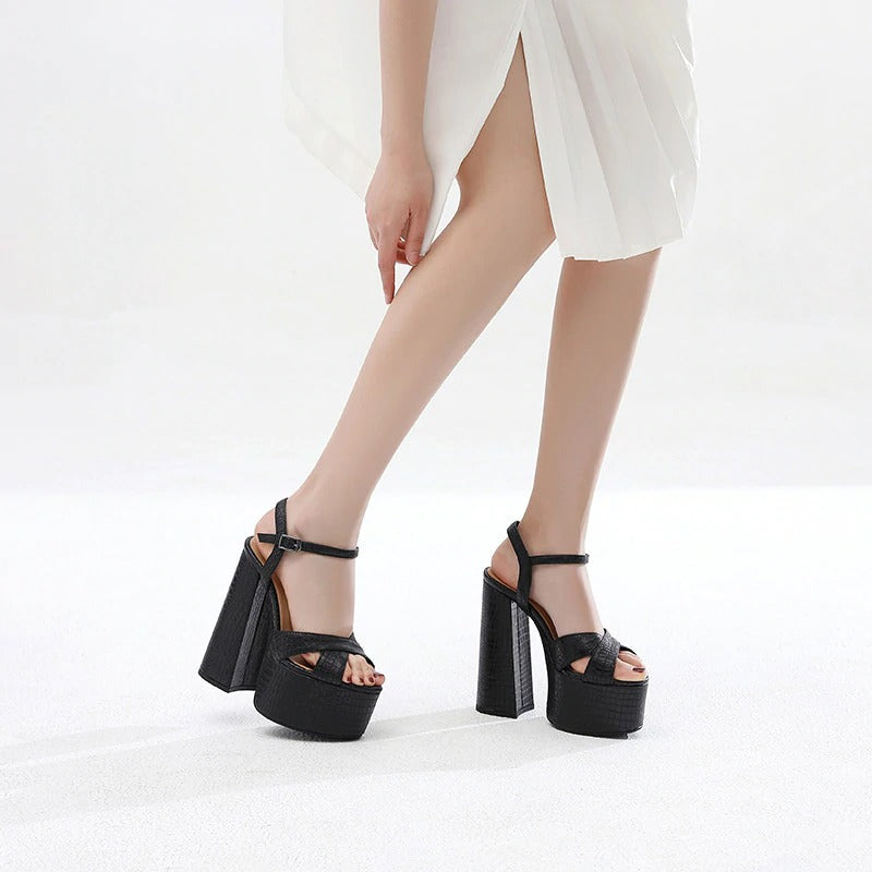 Genuine leather sexy heel platform black sandals for women, showcasing trendy design and stylish buckle straps.