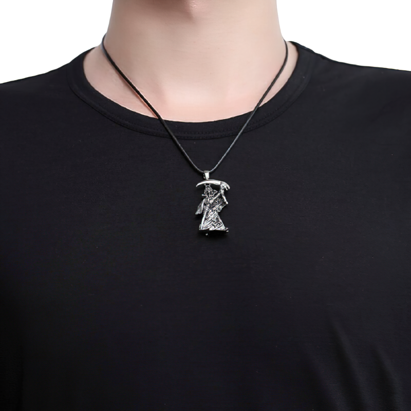 Men's gothic stainless steel skull pendant on a black shirt, adding edgy style to any outfit.