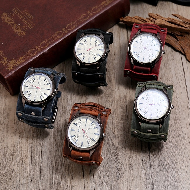 Quartz men's watches with leather straps in five colors displayed on wooden surface.
