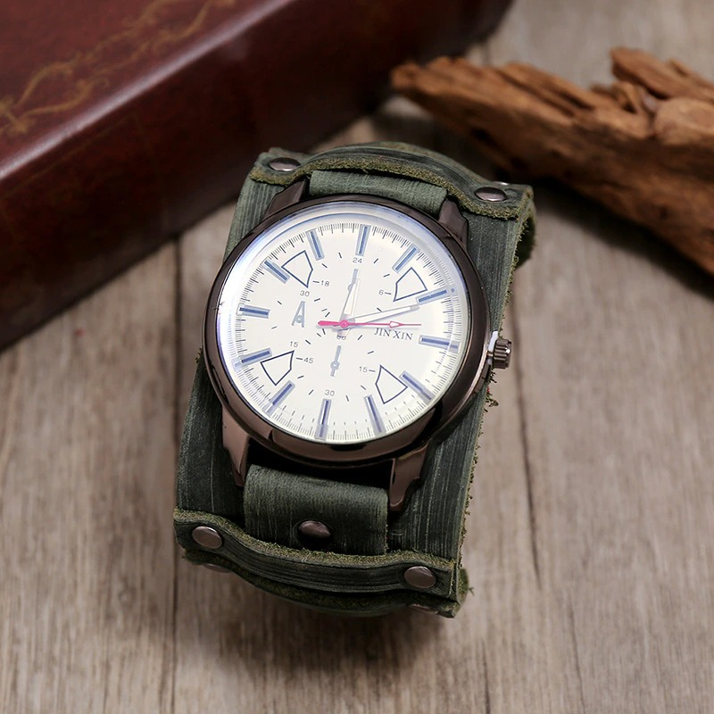 Men's quartz watch with white dial and green genuine leather strap on wooden table.