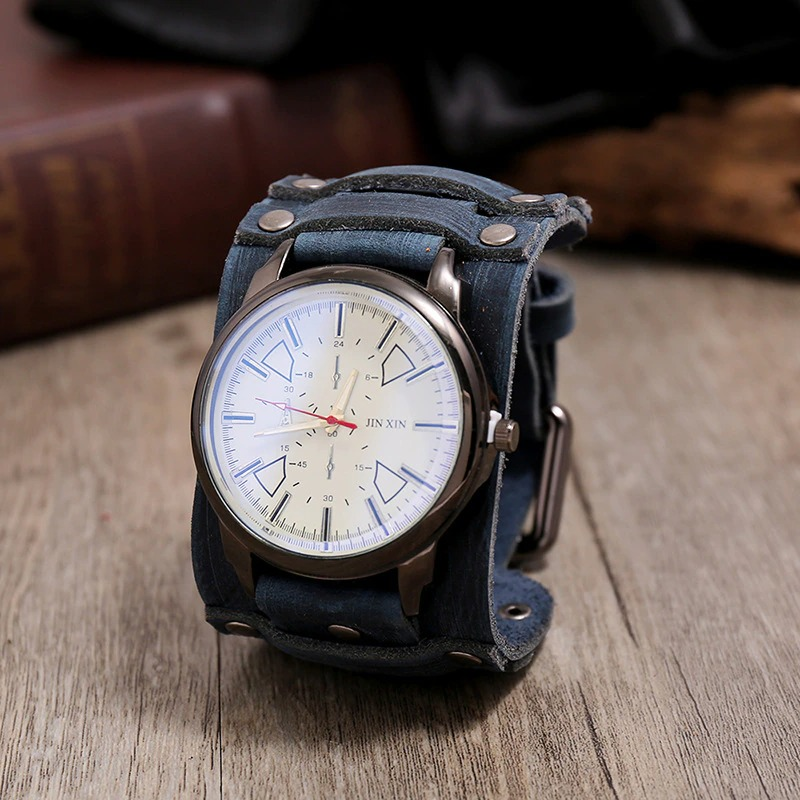 Stylish quartz men's watch with a blue leather strap, featuring a classic round face and casual design for everyday wear.