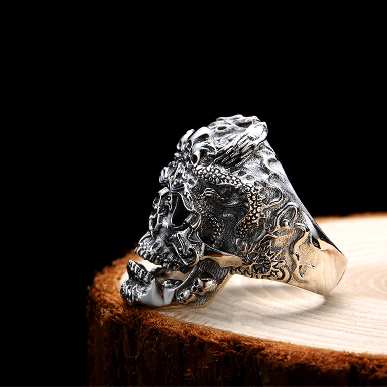Real 925 Sterling Silver Skull Ring on wood, showcasing intricate biker jewelry design for bold fashion.