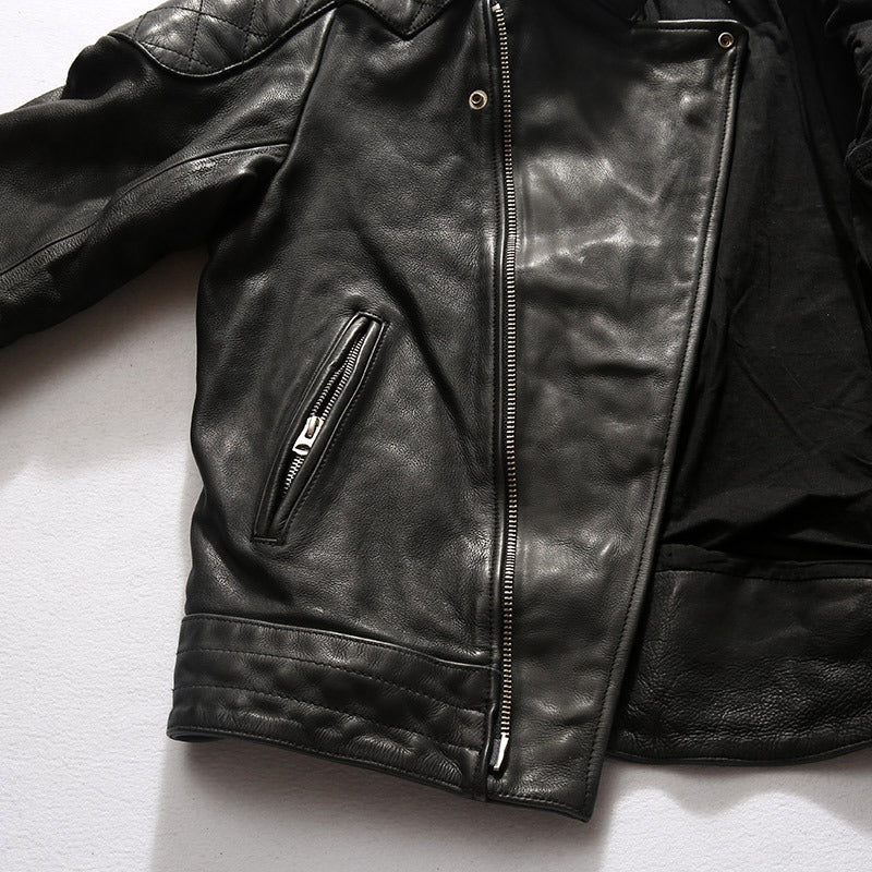 Men's black retro leather jacket with a minimalist design and side zippered pocket, perfect for bikers and casual wear.