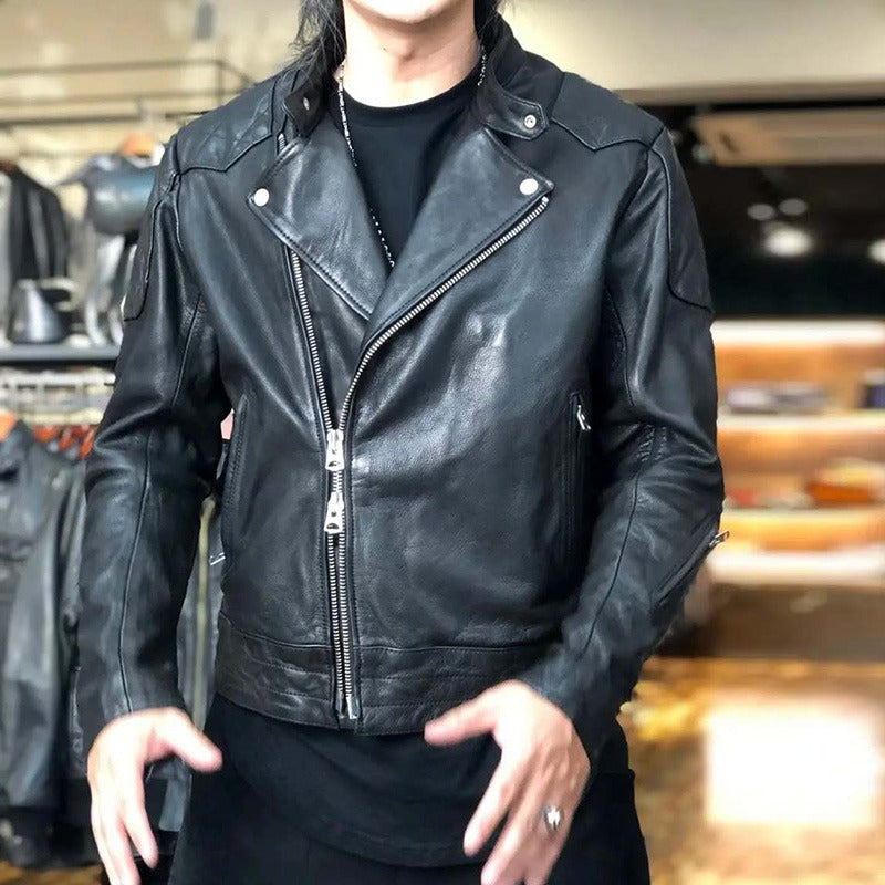 Men's black leather retro biker jacket with minimalistic design and zip closure, perfect for rides and festivals.
