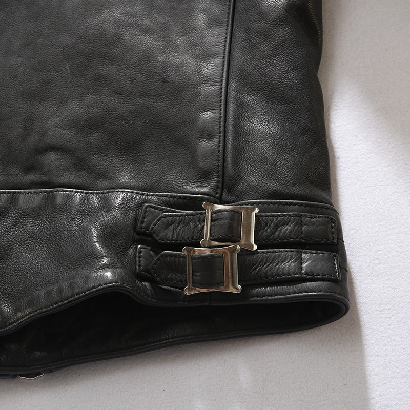 Close-up of Real Leather Men's Black Retro Jacket with buckle detail and minimalistic design.