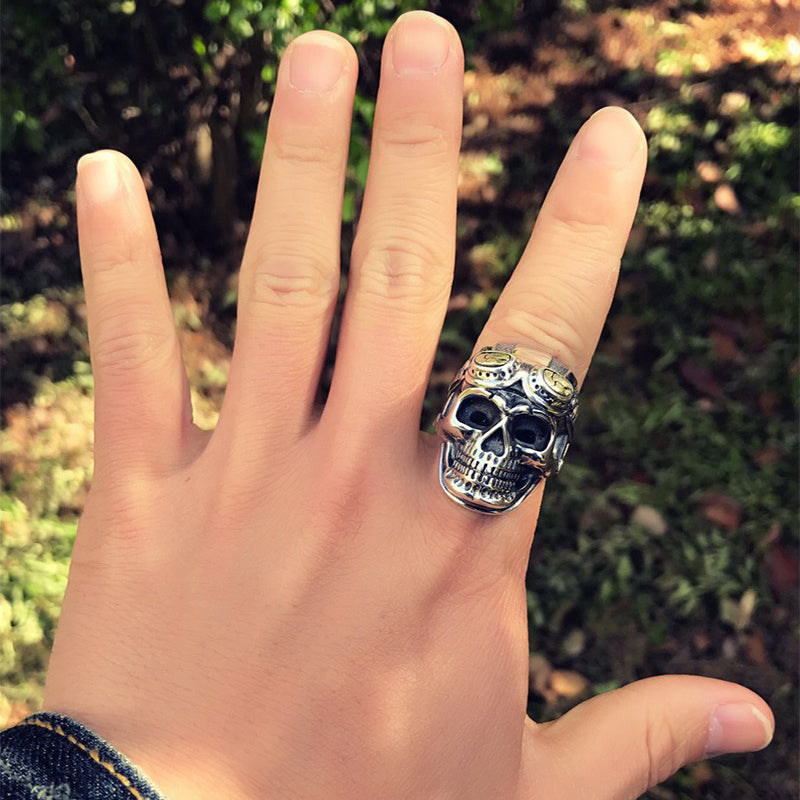 925 silver aviator skull adjustable ring on hand; unisex biker jewelry for rock style lovers