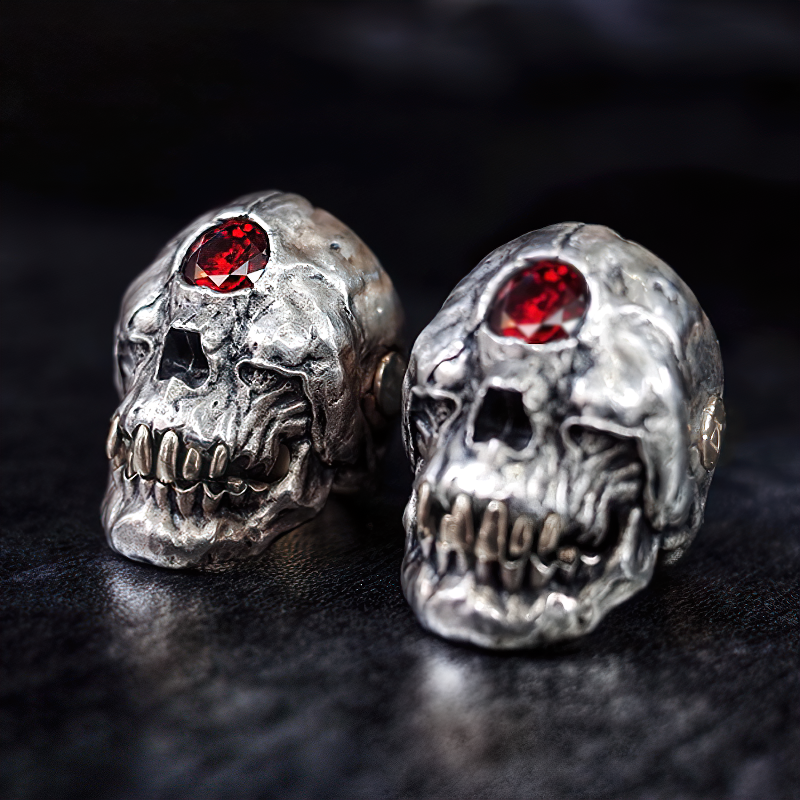 Stainless steel red crystal skull ring, unisex gothic jewelry for men and women, featuring unique skull design.