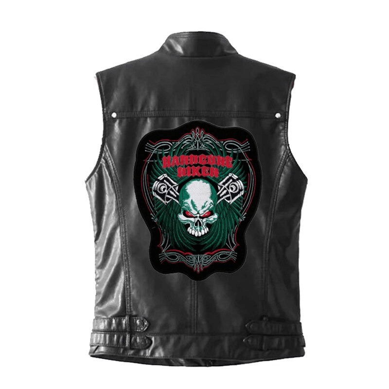 Red eyes skull iron-on patch on black biker vest for stylish outerwear accessories.