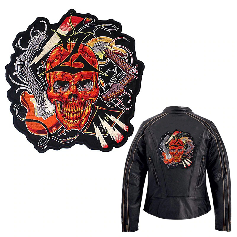 Red skull with guitars embroidered patch for biker jackets, perfect iron-on decoration for a rock style.