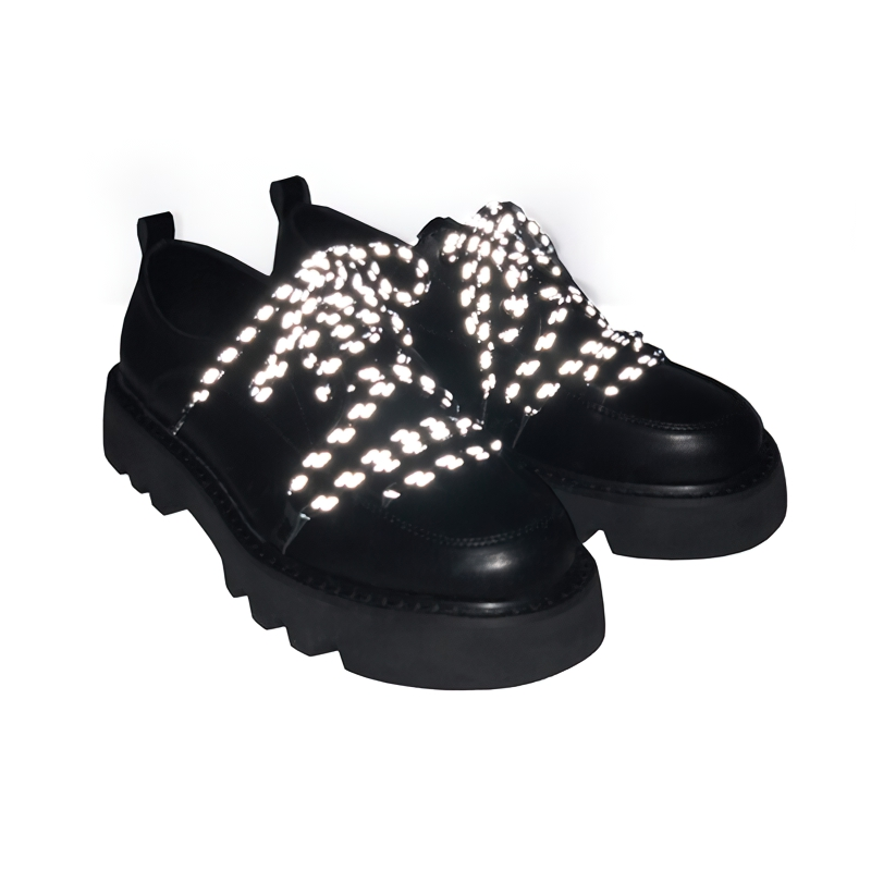 Stylish black reflective shoes for men with thick platform soles and bright laces, perfect for casual wear.