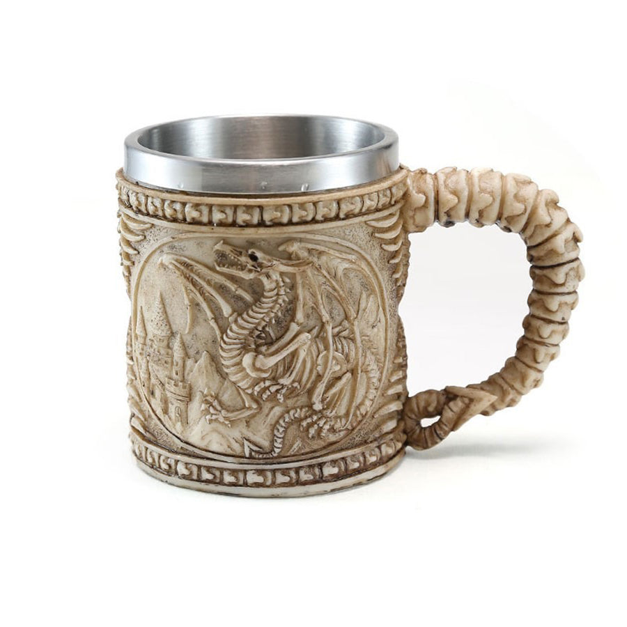 Vintage resin and stainless steel beer mug with dragon design, perfect for Viking-themed bar or collection.