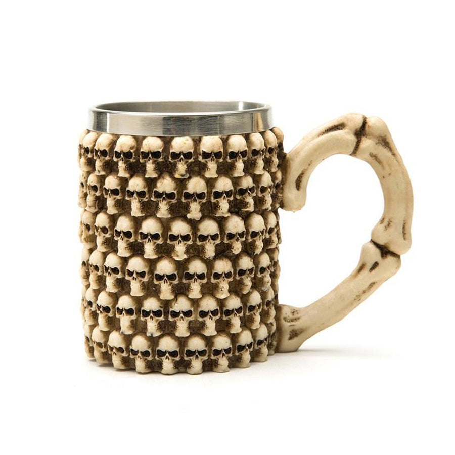 Gothic resin and stainless steel beer mug adorned with skulls and a bone handle.