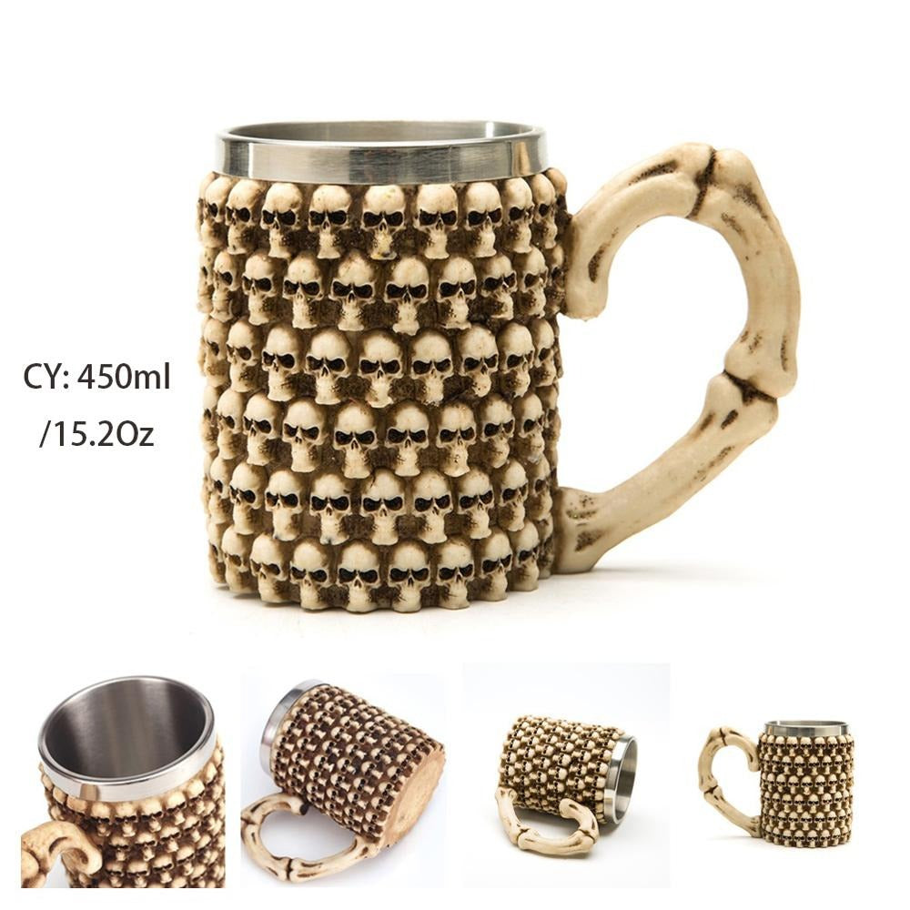 Resin and stainless steel 450ml mug with skulls and bone-style handle, perfect for Gothic decor and barware.