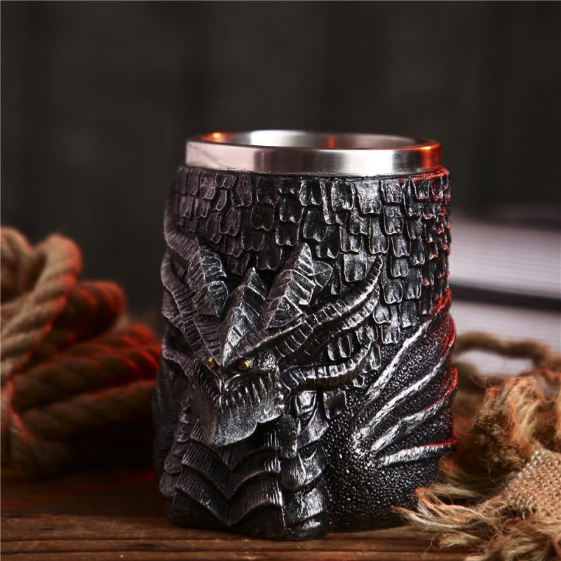 Vintage-style beer mug with medieval dragon design in resin and stainless steel, perfect for Viking-themed gatherings.