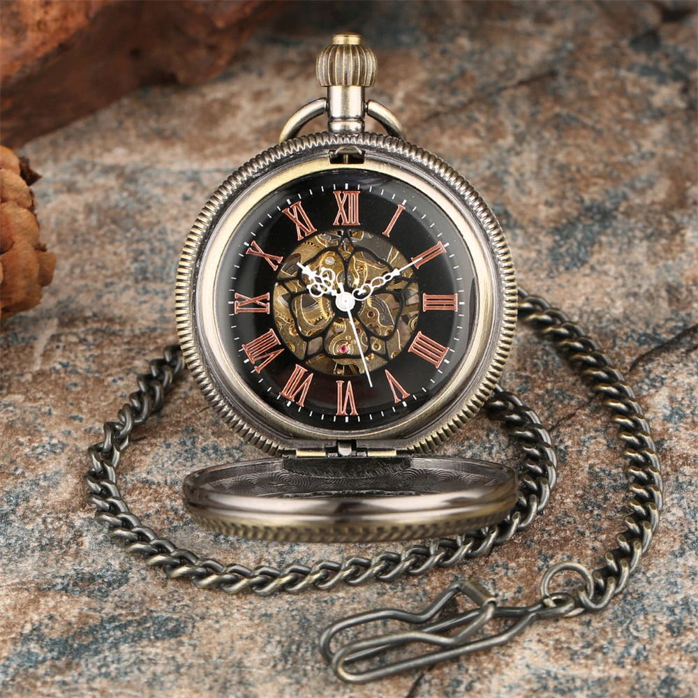 Vintage mechanical pocket watch with ornate details, black dial and chain, perfect retro accessory for men and women.