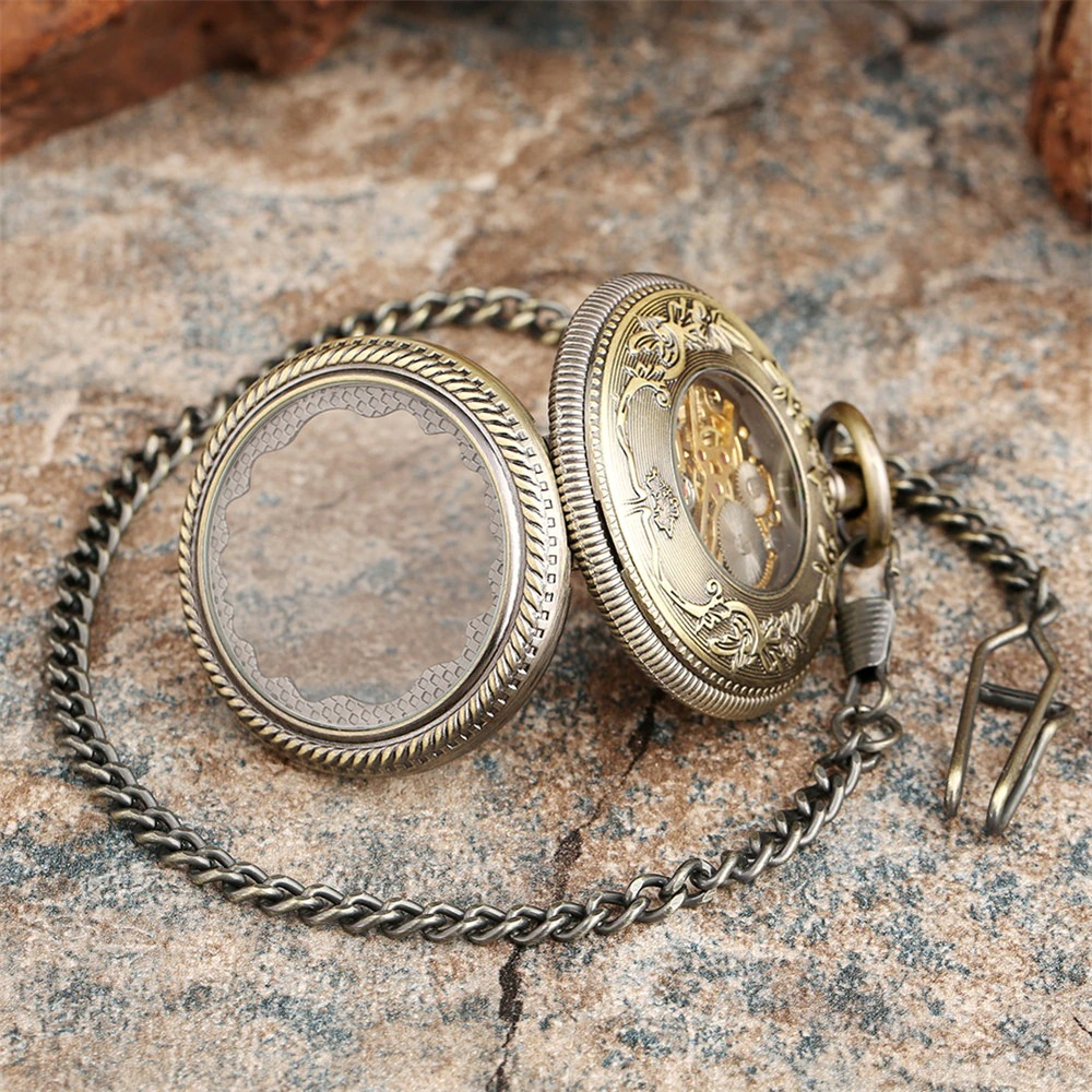 Antique mechanical pocket watch with chain, featuring intricate designs and a vintage style for men and women.