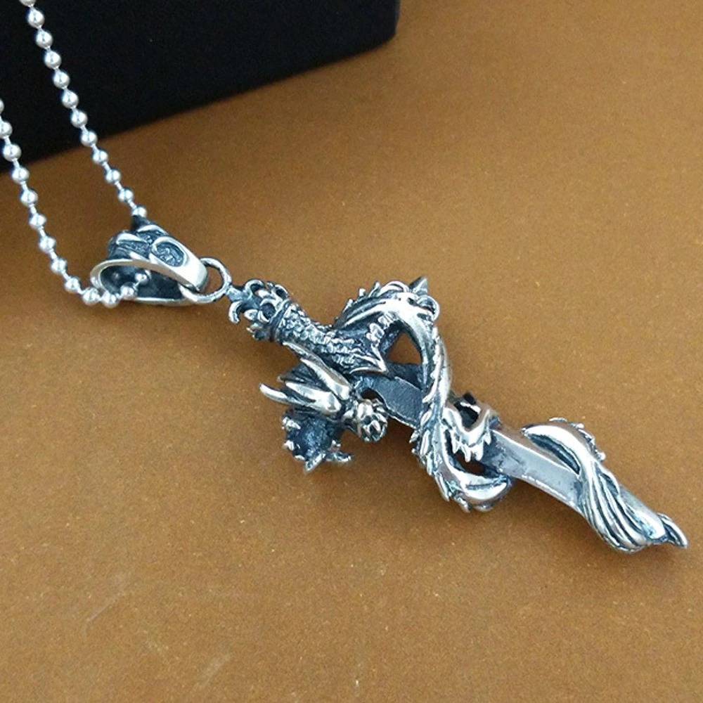 Unique retro pendant featuring a sword adorned with a detailed dragon, crafted from real s925 pure silver.