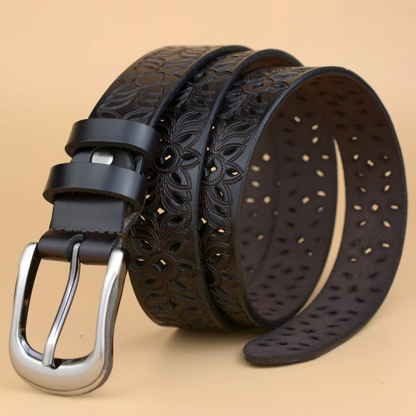 Genuine leather women’s belt with hollow floral designs and a stylish pin buckle, perfect for rock style outfits.