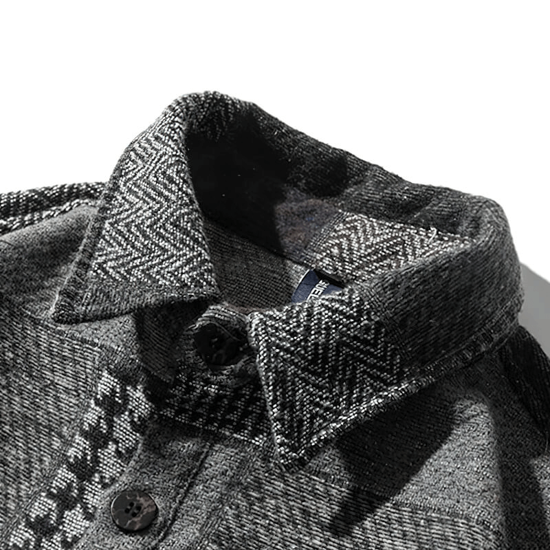 Close-up of a retro woolen plaid shirt collar, showcasing intricate stitching and stylish buttons.