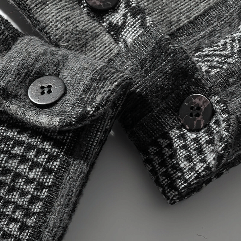 Close-up of retro woolen plaid shirt with fashion buttons, showcasing its stylish stitching pattern and quality material.