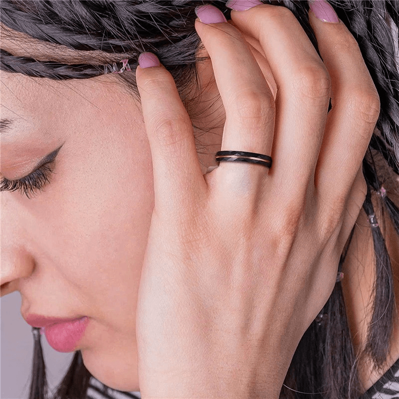 Unisex Rhombus Patterned Tungsten Steel Band Ring worn by a model, showcasing retro cool style with elegance.